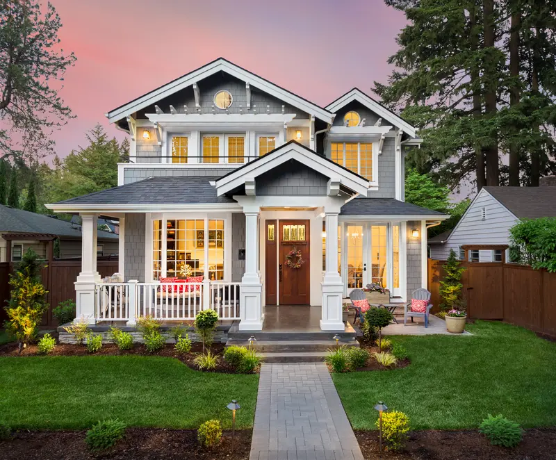 Beautiful craftsman home exterior with grey siding and white trim
